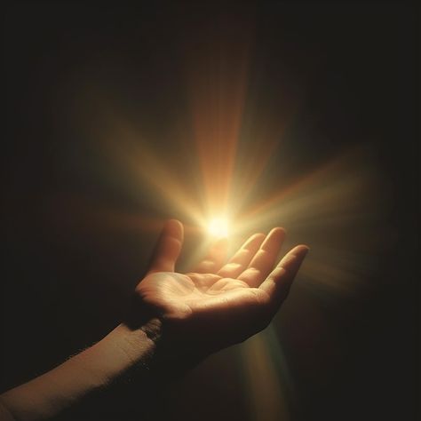 Man's hand reaching for the sun on a dark background with rays of light Light Rays Photography, Hands Reaching Reference, Light Symbolism, La Jetee, Twin Crowns, Reaching Hand, Photoshoot Lights, Playing With Light, Hand Shadows