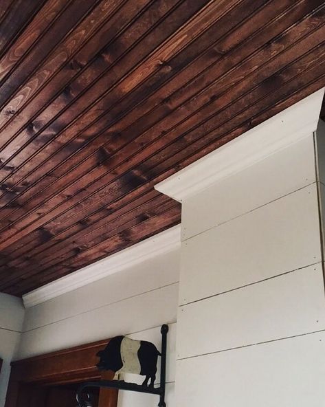 Beadboard ceiling is finished and we are putting up crown molding. It's looking like a million bucks! 😍#farmhouse #shiplap #beadboard… Beadboard Ceiling Living Room, Stained Beadboard Ceiling, Stained Beadboard, Ceiling Crown, Accent Wall Entryway, Farmhouse Shiplap, Accent Wall Stencil, Shiplap Ceiling, Plank Ceiling