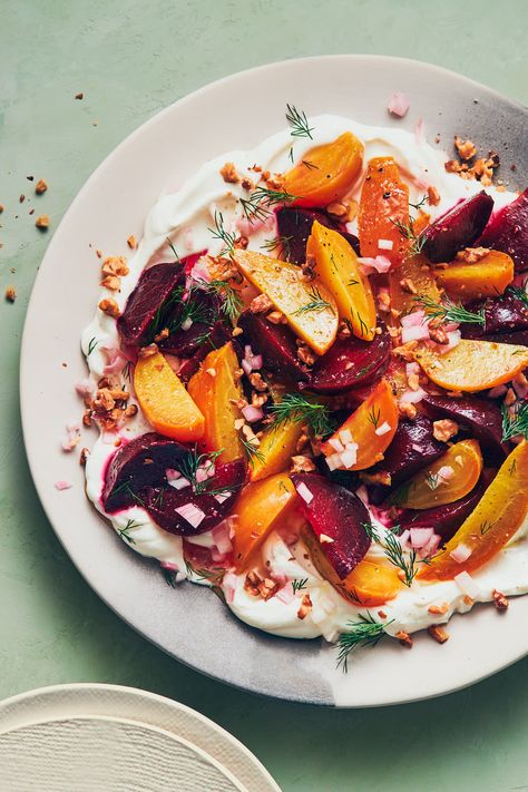 Roasted yellow and red beets on a bed of labneh and topped with fresh dill Pickled Shallots, Roasted Beet Salad, Delicious Magazine, Beet Salad, Roasted Beets, Honey Recipes, Toasted Walnuts, Beets, Hazelnut