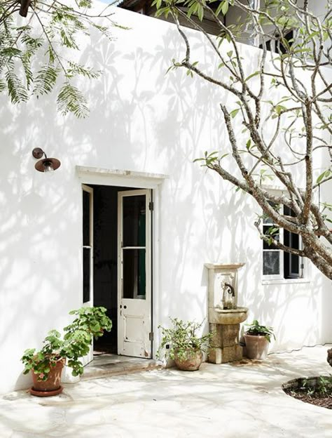 Using recycled timbers, salvaged windows and antique tiles, this Australian beachside home has an authentic Mediterranean feel. Medeteranian Homes, Mediterranean Windows, Greek Bedroom, Floor Windows, Brunswick Heads, Salvaged Windows, Greek Villa, Mediterranean Homes Exterior, Eco Cabin