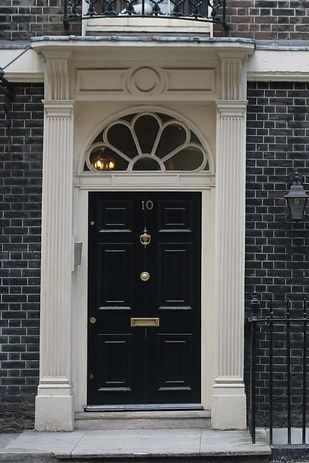 The pretend 10 Downing Street, The Strand, London.  Number 10 Adam Street, The Strand looks almost exactly like its more famous counterpart over on Downing Street - making it the perfect backdrop for photos. In fact, try to guess which is the REAL 10 Downing Street. Compton Street, 10 Downing Street, Hidden London, Great Fire Of London, Downing Street, London Places, Trafalgar Square, Number 10, London Town