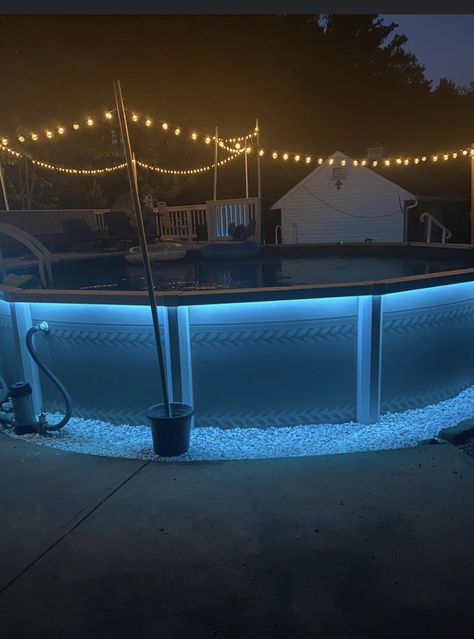 Round Above Ground Pool Landscape Ideas, Above Ground Pool Walkway Pathways, Costco Pool Ideas, Light Around Pool, Pool Ideas Small Backyards, Lights Around Pool, Outdoor Pool Area Above Ground, Easy Pool Deck, Pool Lighting Ideas