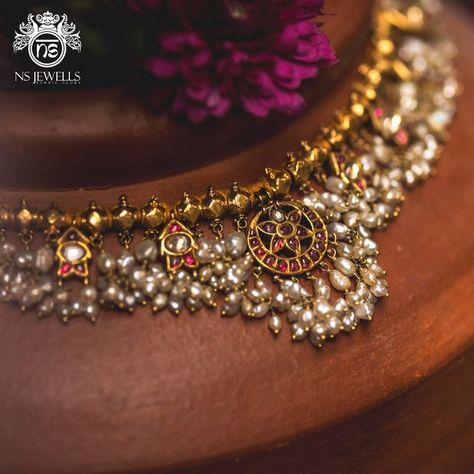 NS Jewells on Instagram: "An old antique Guttapusalu : the pearl embellished traditional gold necklace, a classic heritage jewellery hailing from Andhra Pradesh.

We got lucky to find a vintage one, in such pristine condition!

With all these Basra pearls and Burmese old rubies! Truly a beautiful treasure! 

Find such stunning traditional pieces at NS Jewells, Lavelle Road, Bengaluru.

.
📷 : @romaganeshphotography 
.
.
.
.
.
.

[ jewellery, handmade jewellery, gold, silver, diamonds,emerald, bridal jewellery, wedding jewellery, engagement rings, pearls, necklace, earrings , authentic antiques, gold plated, real gold jewellery]

.
.
.
.
.
.

#everydayjewelry #simplejewelry#handcraftedjewellery #custommadejewellery #jewellery 
#goldjewellery #gold #traditionaljewellery #diamonds #emerald #g Moti And Gold Necklace, Old Jewellery Designs, Pearl Emerald Necklace, Antique Guttapusalu, Old Indian Jewellery, Gold Pearl Jewelry Necklace, Traditional Jewelry Antique, Basra Pearls, Traditional Gold Necklace