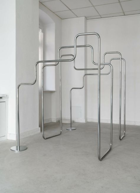 Industrial Space Design, September Studio, Studio Design Ideas, Bauhaus Interior Design, Industrial Clothing Rack, Industrial Clothing, Wassily Chair, Steel Rack, Clothing Store Interior