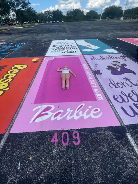 Barbie Senior Parking Spot, Friends Parking Spot Painting, Graduation Boxes, Cute Parking Spot Painting Ideas, Senior Parking Spaces Funny, Highschool Parking Spot Ideas, Painted Parking Spaces Ideas, Senior Spots, Senior Boxes