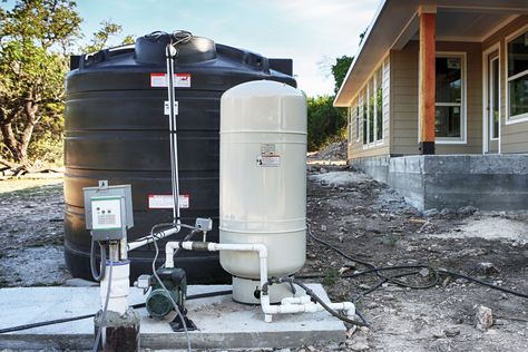 All About Water Storage Tanks - This Old House Water In House, Well Water System, Stone Veneer Fireplace, All About Water, Small Bathtub, Jet Pump, Well Drilling, Water Storage Tanks, Storage Tanks