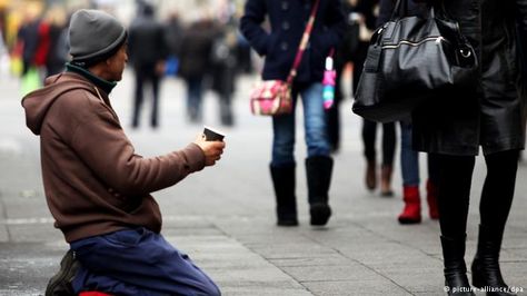 What is the biggest challenge for development in poor countries when looking at this year's report? A begger kneels on the streets (Photo: Andres Benedicto/dpa) Basics Of Economics, Basic Economics, Poor Countries, Human Development, Financial News, Street Photo, Philosophers, Economics, World News