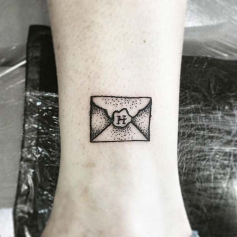 47 Cool and Magical Harry Potter Inspired Tattoos | Page 5 of 5 | StayGlam Secret Harry Potter Tattoo, Harry Potter Envelope Tattoo, Harry Potter Letter Tattoo, Hogwarts Letter Tattoo, Harry Potter Friend Tattoos, Hogwarts Tattoos, Small Harry Potter Tattoo Ideas, Unique Harry Potter Tattoo, Harry Potter Inspired Tattoos