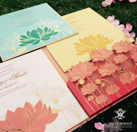 3D wedding invite | pink yellow and green illustrated lotus with gold accents | Indian Wedding Invitation Ideas| Credits: White Mirage Luxury Invites | Every Indian bride’s Fav. Wedding E-magazine to read. Here for any marriage advice you need | www.wittyvows.com shares things no one tells brides, covers real weddings, ideas, inspirations, design trends and the right vendors, candid photographers etc. Pastel Wedding Invitations, Indian Invitations, Wedding Card Design Indian, Indian Wedding Invitation Card Design, Unique Wedding Cards, Indian Wedding Invitation Cards, Indian Wedding Cards, Wedding Indian, Wedding Invitation Card Design