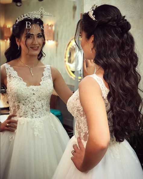 Sophisticated Crown Hairstyles for All Hair Types Half Up Half Down Wedding Hair With Crown, Bride Hairstyles With Veil, Quince Hairstyles For Curly Hair, Bridal Hair Half Up Half Down, Crown Updo, Bridal Hair Tiara, Wedding Hairstyles With Crown, Hairstyles For All Hair Types, Bridal Hair Half Up