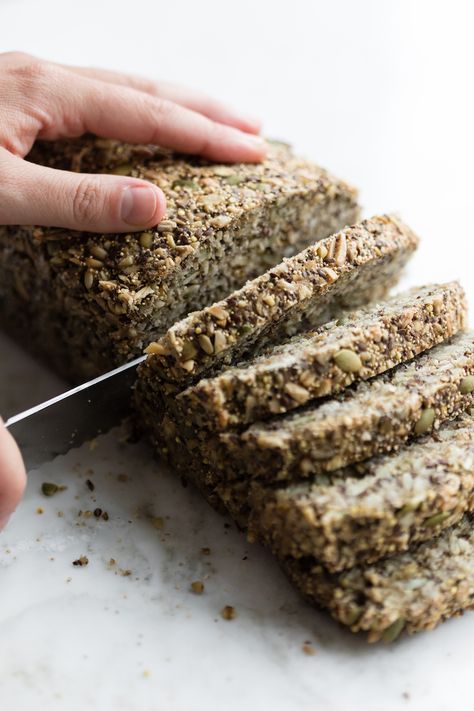 Ancient Grain, Seed, and Nut Loaf From The Greenhouse CookbookFor day one of our plant-based challenge, we’re getting our meal in early. We’re nibbling on this dense, dark loaf, first featured in The Greenhouse Cookbook, and inspired by the... Gluten Free Ezekiel Bread Recipe, Nut And Seed Bread Recipe, Ezekiel Bread Recipe, Seeded Bread Recipes, Dried Garlic, Nut Loaf, Bagel Toppings, Healthy Foods To Make, Ezekiel Bread