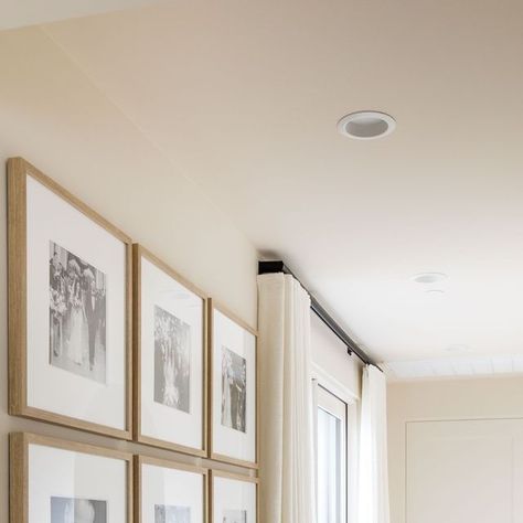 Pure Salt Interiors on Instagram: "We love this hallway in our #coastalcanyonproject! Gallery walls don't just have to be in public spaces of your home, we like to think every space is a design opportunity, and this passthrough from the master bedroom to the ensuite was the perfect place for a display of family photos. Such a personal and pretty feature for this home✨⁣ ⁣ Don't forget! All art is 15% off all week long with code ARTATTACK // 📷: @vlentine" Pure Salt Interiors, California Casual, Hallway, Public Space, Perfect Place, Our Love, Family Photos, Gallery Wall, Bedroom