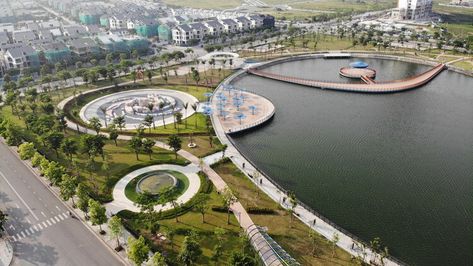 Astronomy Park is a public park project in Hanoi. The project is located in a new development area in the West of the city and is Vietnam’s first astronomy park. Construction project surrounds Bach Hop Thuy lake, an abandoned detention basin of Duong Noi urban area. This project is a boost to the real estate while also significantly improving the quality of life and public space in the new district of Hanoi. Lake Landscape Architecture, Lake Landscape Design, Waterfront Pavilion, Vietnam Architecture, Waterfront Design, Lakeside Park, Linear Park, Water Playground, City Layout