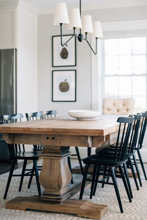 This combination doesn't get old - wood table, black chairs, neutral rug, linear chandelier, white centerpiece bowl. And there's so much room to play with style and shape to make it yours. We love when a client is willing to go bold and out of the box. We also love this - simple and timeless. Where do you fall on the scale of Simple and Timeless to Bold and Unique? #designingfavoriteplaces Design: @grayoakstudio Project: Prospect Dining Room Photography: @callanphoto Wood Table Black Chairs, Table Black Chairs, Black Kitchen Chairs, Black Wood Dining Table, Timeless Dining Room, Light Wood Dining Table, Black Chairs, Black Dining Room Chairs, Kitchen Table Wood