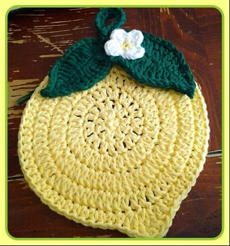 Cute Lemon Crocheted Trivet/Potholder. (Should make 2-like the Apple tutorial-and stitch them together.   Much thicker and safer to use.   Cotton yarn only, or some natural fiber.) Crochet Lemon Potholder Pattern, Crochet Pot Holders, Crochet Potholder Patterns, Crochet Potholder, Crochet Hot Pads, Crochet Pot, Kitchen Crochet, Crochet Fruit, Dishcloth Crochet Pattern