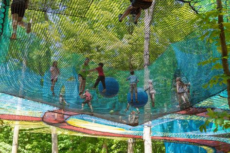 Bounce and Caper Among the Trees at UPLÅ, Canada's Biggest Trampoline Parks — Colossal Trampoline Parks, Concrete Exterior, Outdoor Trampoline, Wire Installation, Forest Canopy, Colossal Art, Trampoline Park, Embrace Nature, Visual Culture