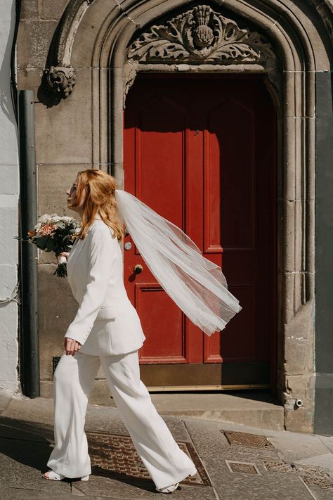 City Chambers Edinburgh wedding with bride in a trouser and jacket suit with finger tip veil Bridal Suit With Veil, White Suit Bride, London Registry Office Wedding, Wedding Suits For Women, Registry Office Wedding Dress, Wedding Suit Women, Wedding Suits For Bride, Brides Veil, Bridesmaid Suits