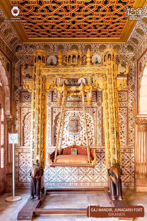 No trip to the Junagarh Fort is complete without exploring the Gaj Mandir. Known for its golden lacquer work and the stunning sandalwood cradle of Lord Krishna, it takes opulence to a whole new level. Junagarh Fort Bikaner, Hindu Architecture, South Asian Aesthetic, Heritage Architecture, Luxury House Interior, Fashion Architecture, Asian Aesthetic, Luxury House Interior Design, Best Architecture