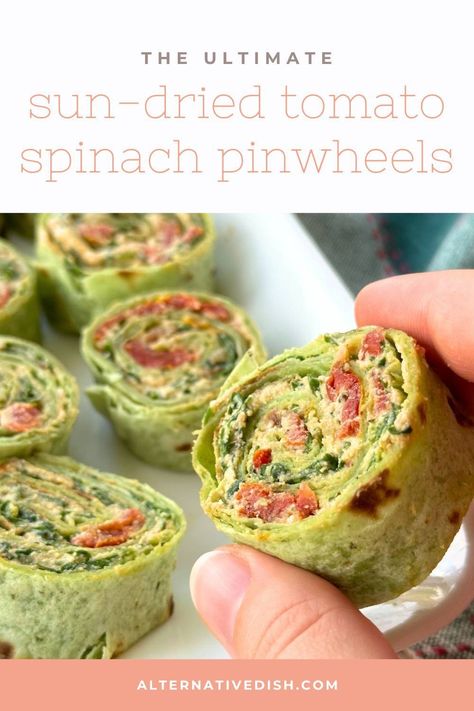 This easy vegan pinwheels recipe with tofu ricotta, sun-dried tomato, roasted garlic, and spinach is full of flavor and an easy finger food that the whole family will love. Tortilla roll ups are the perfect appetizer during the holiday season with festive red and green colors. Plus, they come together quickly for a low-stress but fun appetizer that will fit right in on your holiday table. Vegan Pinwheels, Spinach Pinwheels, Spinach Roll Ups, Vegan Tortilla, Tortilla Pinwheels, Pinwheel Sandwiches, Tofu Ricotta, Roll Ups Tortilla, Pinwheel Recipes