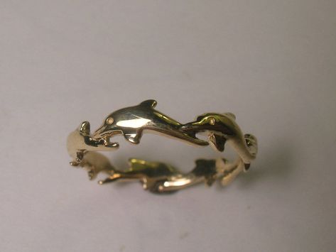 Beautiful hand carved swimming dolphins ring in 14 kt yellow gold with 7 dolphins circuling finger. Can be orderd in sizes 5.5 to 7. Makes a great gift. Can be worn as a toe ring. Swimming Dolphins, Bell Gardens, Dolphin Ring, Dolphin Jewelry, Summer Rings, Gold Girl, Jewelry Workshop, Butterfly Jewelry, Funky Jewelry