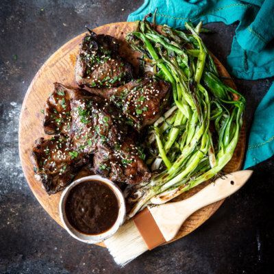 Korean Lamb Chops with Grilled Scallions Korean Lamb Chops, Korean Lamb Recipe, Grilled Lamb Recipes, Grilled Lamb Chop Recipes, Gorgonzola Recipes, Lamb Loin Chops, Grilling Recipes Sides, Lamb Loin, Grilled Lamb Chops