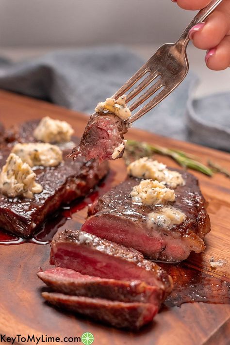 This chuck eye steak recipe tastes just like ribeye, but for a fraction of the cost! This affordable, tender, juicy, and flavorful steak is cooked to perfection and then coated in an amazing herb and garlic butter. KeyToMyLime.com