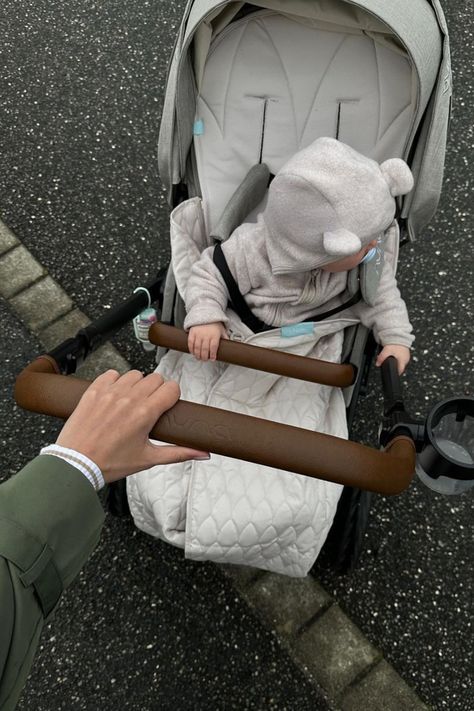 Baby sitting in a stroller wrapped in the Najell light Footmuff Accidents Happen, Stroller Accessories, Universal Design, Baby Warmer, Sleeping Bag, Laundry Bag, Stroller, Design