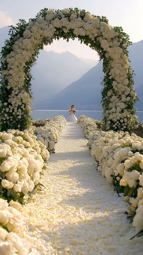 Create your dream wedding with stunning outdoor wedding ideas at Lake Como! Picture a romantic ceremony framed by mountains, elegant blooms of white roses & peonies, and a golden sunset. Bring your vision to life! #LakeComoWeddings #ElegantBlooms #OutdoorWedding #Midjourney Winter Wonderland Wedding Reception, Wedding Manifestation, Chic Wedding Venues, Elegant Outdoor Wedding, Romantic Ceremony, Wedding Outside, Spain Wedding, Ocean Wedding, White Wedding Theme