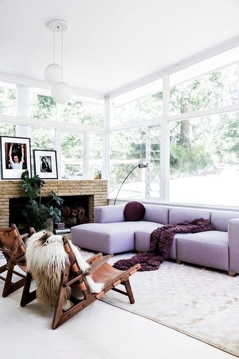 This lilac sofa makes a dramatic style statement in this light and airy home. It’s used on the sofa only and not anywhere else in the room, so the sofa becomes the focal point and the scheme avoids being overly feminine. image credit:    Homes To Love AU Stylish Living Room, Livingroom Layout, Open Plan Living, Decorating On A Budget, Small Living Rooms, Small Living Room, Eclectic Decor, Colorful Interiors, Living Room Designs