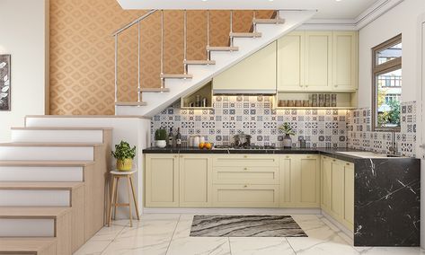 A small kitchen design under stairs in l-shaped is ideal for compact homes Kitchen Near Staircase, Kitchen Cabinet Under Stairs, Kitchen Below Stairs, Under Stair Kitchen Ideas, Kitchen Set Under Stairs, Kitchen Sink Under Stairs, L Shape Stairs Design, Small Kitchen Under Stairs Ideas, Kitchen Design Under Stairs