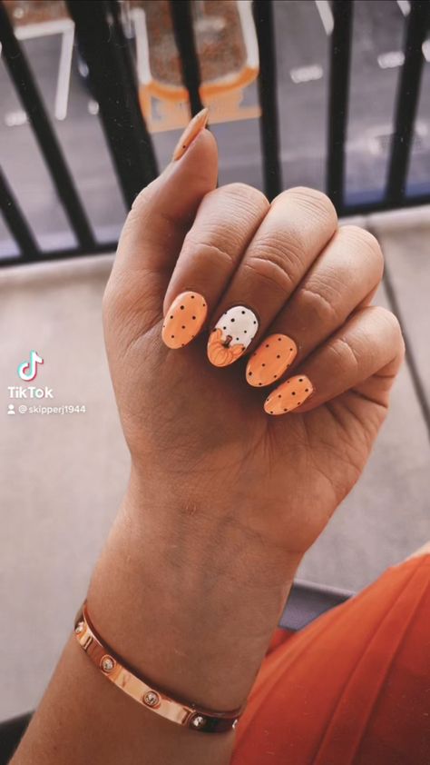 Nails, fall, Disney, pumpkin Autumn Nails Long Almond, Fall Almond Nails Pumpkin, Cute Fall Simple Nails, Cute Aesthetic Fall Nails, Fall Nail Inspo Pumpkin, Fall Nails With A Pumpkin, Almond Pumpkin Nails, White Nails With Pumpkin Design, Disney October Nails