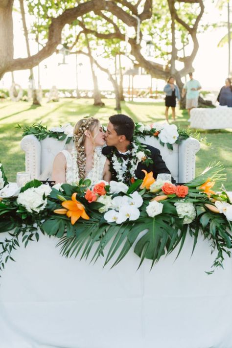 Becca & Adrian hosted their Disney Wedding in Hawaii with tropical floral on wedding reception sweetheart table! Tropical Sweetheart Table, Lilo And Stitch Wedding, Reception Sweetheart Table, Hawaii Wedding Venues, Wedding Sweetheart Table, Wedding Venues Hawaii, Stitch Wedding, Wedding In Hawaii, Sweetheart Table Wedding