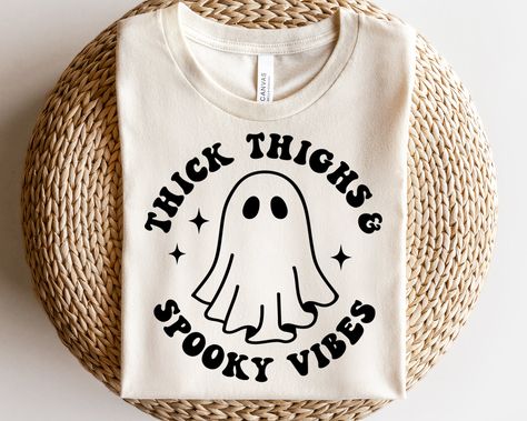 Halloween T Shirts Design, Thick Thighs And Spooky Vibes Svg, Cricut Shirt Projects, Spooky Shirt Ideas, Halloween Tshirt Design Ideas, Mom Halloween Shirt, Funny Halloween Shirts For Women, Cute Vinyl Shirts Women, Halloween Cricut Shirts