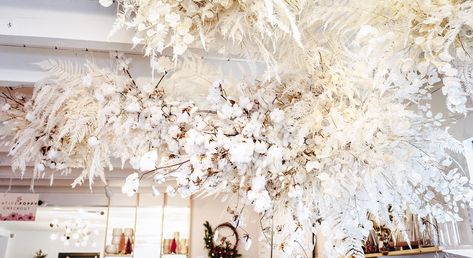 Lunaria cotton and bleached fern installation by Ashley Renuart Fern Installation, Lunaria Wedding, Suspended Flowers, Bleached Fern, Dried Lunaria, Pop Up Shop Design, Floating Florals, Store Merchandising, Winter Chalet