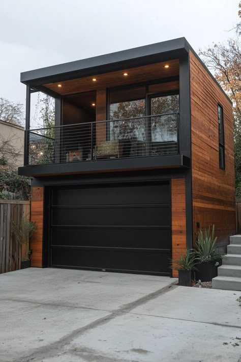 Modern garage unit with upstairs home office. Check out these stunning modern houses with a garage that blend functionality and style seamlessly. Modern Adu Over Garage, Small Garage Loft Ideas, Industrial Modern Architecture, Upstairs Apartment Ideas, Modern Garage With Apartment Above, Garage With Office Above, Modern Tiny House Exterior, Above Garage Office, Small Garage Apartment