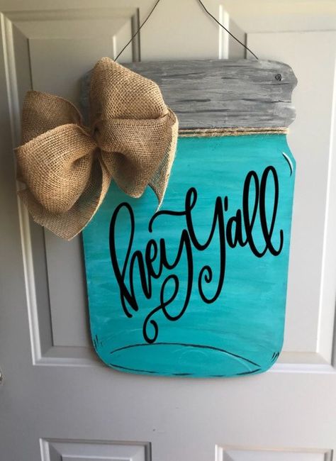 Wooden Mason Jar Door Hanger with burlap bow Mason Jar Door Hanger Wooden, Dollar Tree Mason Jar Sign Makeover, Wood Mason Jar Door Hanger, Wooden Mason Jar Door Hanger, Mason Jar Door Hanger Ideas, Mason Jar Wooden Door Hanger, Mason Jar Hanger, Jar Decorations, Mason Jar Door Hanger