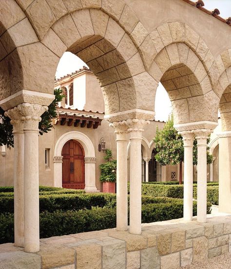 Byzantine arches and hand-carved double columns frame the motor court at this Italianate villa. Interior design by #suzannetucker… Tuscan Mansion, Addison Mizner, Plaster House, Tuscan Homes, Rustic Entry, Montecito California, Mediterranean Exterior, Rustic Exterior, Mediterranean Architecture