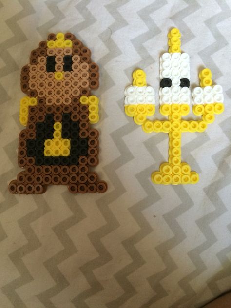 Lumiere and cogsworth, the lamp and the clock, from Disney's beauty and the beast perler beads Beauty And The Beast Perler, Lumiere And Cogsworth, Hama Beads Disney, Perler Bead Designs, Melt Beads Patterns, Modele Pixel Art, Hamma Beads Ideas, Easy Perler Bead Patterns, Melty Bead Patterns