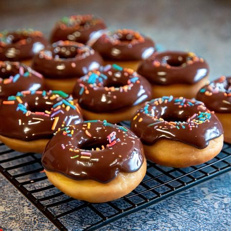 Chocolate Frosted Baked Donuts 🍩🍫 These Chocolate Frosted Baked Donuts are a delightful treat that are easy to make and perfect for any occasion! Ingredients For the Donuts: 1 cup all-purpose flour ½ cup granulated sugar 2 teaspoons baking powder ¼ teaspoon baking soda ¼ teaspoon salt ½ teaspoon vanilla extract 2 large eggs ½ cup buttermilk (or regular milk + 1 tablespoon vinegar) ¼ cup unsalted butter, melted ¼ cup cocoa powder For the Chocolate Frosting: 1 cup powdered sugar 2 tablespoon... Chocolate Assortment, Chocolate Donuts, Baked Donuts, Chocolate Frosting, Pretty Food, Granulated Sugar, Powdered Sugar, Cocoa Powder, Unsalted Butter