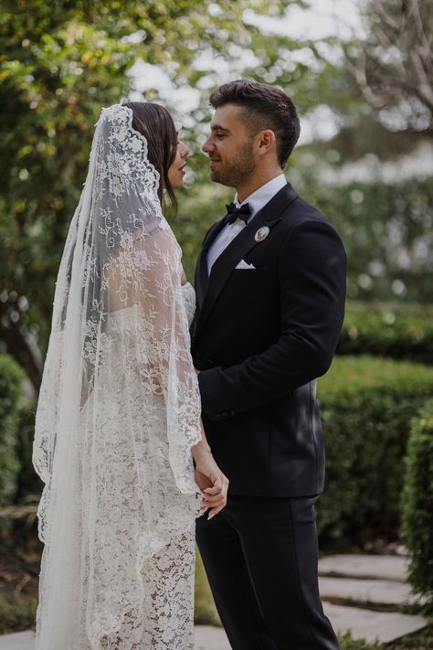 A true ode to romance, this mantilla is woven with airy chantilly lace, cascading around the shoulders like a lyrical love story. Edges are kissed by French Alençon lace, perfect for a graceful, vintage-inspired look. • A classic 45'' knee length bridal veil that is hand sewn from the softest Chantilly lace• The edge of the veil is trimmed with a customizable scalloped lace• In a soft shade of light ivory• A discreet silver, rose gold, or gold metal hair comb is sewn to the underside for easy an Italian Lace Wedding Veil, Wedding Veils Mantilla, Vintage Veils Bridal Lace, Wedding Veil Mantilla, Short Mantilla Veil Wedding, Lace Wedding Dress And Veil, Mantilla Cathedral Veil, Full Lace Veil, Wedding Vail Ideas Head Pieces