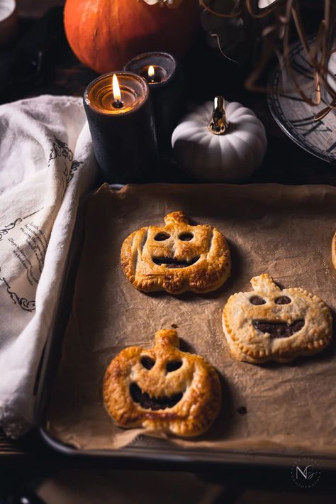 In this step-by-step guide, I’ll walk you through creating these creepy yet oh-so-delicious treats. With these classic pumpkin-shaped Jack O’Lantern pies, you’ll find the perfect puff pastry potion to conjure up Halloween magic. #quickhalloweentreats #easypuffpastryhandpies, #spookyhalloweendesserts Spooky Treats Savory, Pumpkin Shaped Puff Pastry, Halloween Hand Pies Savory, Halloween Food Puff Pastry, Puff Pastry Ghosts, Puff Pastry Halloween Treats, Spooky Pastries, Puff Pastry Halloween Recipes, Halloween Puff Pastry Ideas