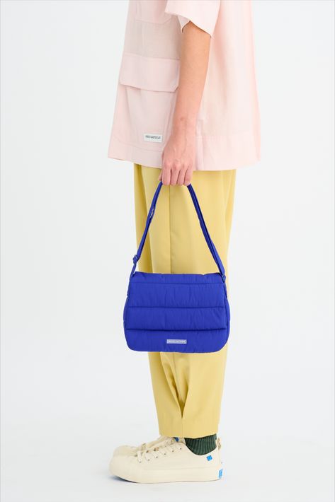 Made from water resistant nylon, this Poofy Bag can be carried on the shoulder or as a cross body bag by adjusting the straps, making it a versatile piece for casual days or formal evenings. Designed with a front flap with a magnetic closure, this structured bag features contrast lining and a detachable pouch that can be taken out to use separately. It also has an inner snap tab for easy access of keys or jewellery, and is finished with a Beyond The Vines rubber label on the front. Beyond The Vines Poofy Bag, Beyond The Vines, Rubber Label, Dream Bags, Bag Obsession, Structured Bag, Vintage Love, Cross Body Bag, Magnetic Closure