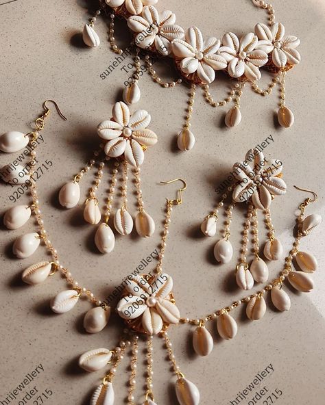 Shell jewellery set

www.sunehrijewellery.com
For order or enquiry
Whatsapp us 9205912715 link in bio
Or order from our website 
.
.
.
.
.
.
...
#kodijewellery #shelljewellery #floraljewellery #haldijewellery #mehendijewellery #flowerjewelleryforbride #floraljewellerycollection #artificialflowerjewellery #floraljewelleryformehendi #floraljewelleryforhaldi #shelljewelry Shell Jewellery For Haldi, Kodi Jewellery, Kori Jewellery, Shells Jewellery, Haldi Jewellery, Best Friend Miss You, Haldi Ceremony Outfit, Cowrie Shell Jewelry, Flower Jewelry Designs