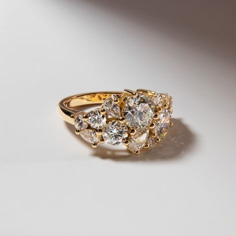 A bespoke diamond cluster design set with round brilliant and pear-cut diamonds and crafted in 18k yellow gold Naveya And Sloane, Cluster Design, Future Engagement Rings, Bespoke Engagement Ring, Antique Jewelry Indian, Pear Cut Diamond, Cluster Engagement Ring, Bespoke Jewellery, Gold Wedding Rings