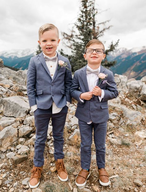 ring bearers- Fall Aspen Colorado Mountain Wedding on GWS- Looking for a venue with a view? The sights in this mountain wedding in Aspen are stunning. With dreamy ceremony flowers, a boho bridal gown and just a bit of snow, this wedding is perfect inspiration for couples looking to tie the knot in the mountains. Kids Wedding Outfits Boys, Wedding Kids Outfit, Kids Wedding Outfits, Mountaintop Wedding, Wedding Outfit For Boys, Mountain Top Wedding, Bearer Outfit, Boho Bridal Gowns, Mountain Wedding Colorado