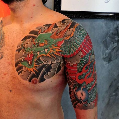 30 Dragon Half Sleeve Tattoos For Men - Fire-Spewing Design Ideas Dragon Tattoo Half Sleeve Men, Mens Dragon Sleeve Tattoo, Colour Tattoo Men, Men’s Dragon Sleeve Tattoo Ideas, Men’s Dragon Tattoo Arm, Chest Tattoo Japanese, Dragon Koi Tattoo Design, Small Japanese Tattoo, Japanese Dragon Arm Sleeve