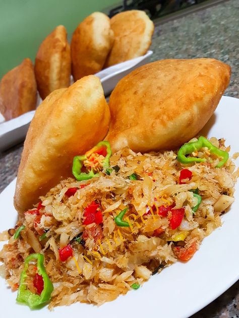 Bakes and Saltfish Trinidad Breakfast Recipes, Saltfish Recipes Caribbean, Saltfish And Bake, Trini Breakfast Ideas, Caribbean Breakfast Ideas, Caribbean Fried Fish, Saltfish Recipes, Bakes And Saltfish, Trinidad Bake And Saltfish