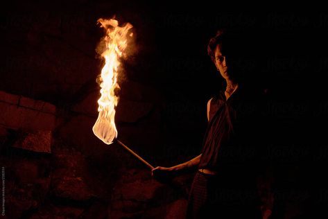 Holding Torch, Werewolf Hunter, Percy Jackson Cabins, Fire Torch, Mysterious Man, Male Pose Reference, Fire Photography, Twelfth Night, Torch Light