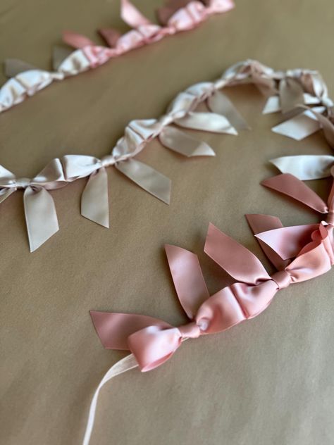 This one of a kind bow garland has been designed with an adorable pattern of baby pink and blush ribbon. This design is perfect for baby showers, bridal showers, little girls rooms, or even decorating for holidays. For more customized garland options, please see my other ribbon garland listings and lets create something beautiful! This ribbon is considered my "large" size and is 52" inches long plus extra ribbon on each end for convenient hanging. Ribbon Party Decor, Mauve Room, Bow Banner, Cute Garland, Pink Garland, Bow Garland, Ballet Party, Bow Baby Shower, Office Birthday