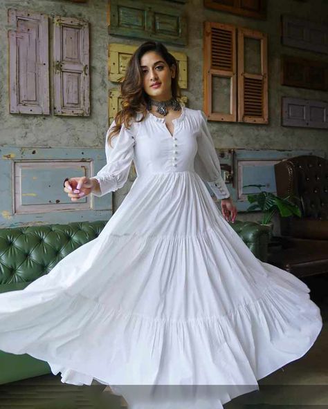 👉🏻PRICE: 3000/PKR (Just Frock) 💓 👉🏻Article No.: (77447) 👉🏻 DETAILS: Radiate Classical Western Grace with our Intricately Designed Beautifully Ultra Flared Long Maxi With Buttoned Front, Puffy Shoulders, Buttoned Cuff Full Sleeves . 👉🏻BRAND: Shan-O-Shoukat Apparel's. 👉🏻SIZE: Free Size 👉🏻MEASUREMENTS: Chest Size: 20" Frock Length: 52" Sleeves Length: 21" 👉🏻 Colours: One Color, One Design 👉🏻STUFF: All Season Fabric. 👉🏻 WHAT'S INCLUDED? 1.) Designer Ultra Flared Long Frock. 👉🏻HOW TO ORDER: For On... White Simple Gown, Long Western Dresses, Frock Designs For Women, Western Frocks, White Cotton Maxi Dress, Simple Gown, Dress Everyday, White Dress Outfit, Anarkali Dress Pattern